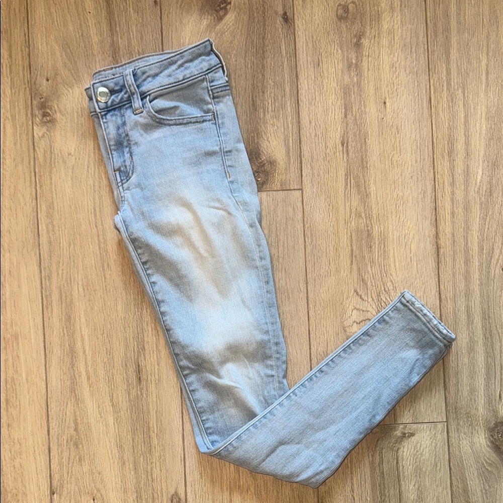 AMERICAN EAGLE Super Super Stretch Long Denim Jeggings Light Wash Blue Jeans